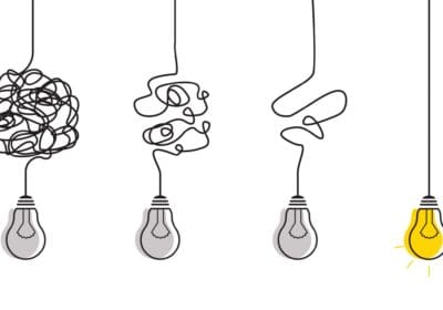 Four lightbulb icons in a row, their wires decreasing in tangle until the last one is just a straight line.