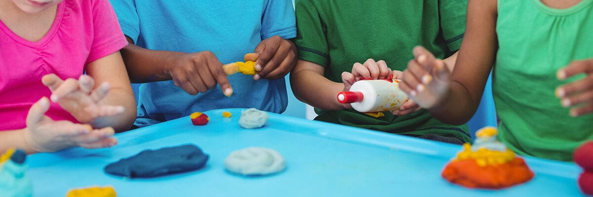 Children express their creativity through modeling clay
