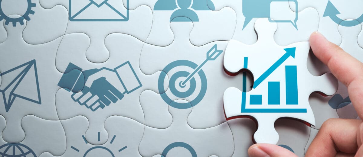 A developer fits together the puzzle pieces of business development