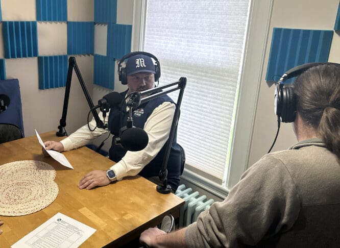 A production takes form in the podcast room